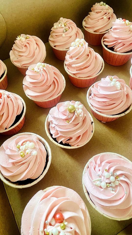 Pink cupcakes with frosting in Playa del Carmen