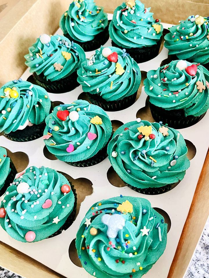 Turquoise cupcakes decorated with sprinkles in Playa del Carmen