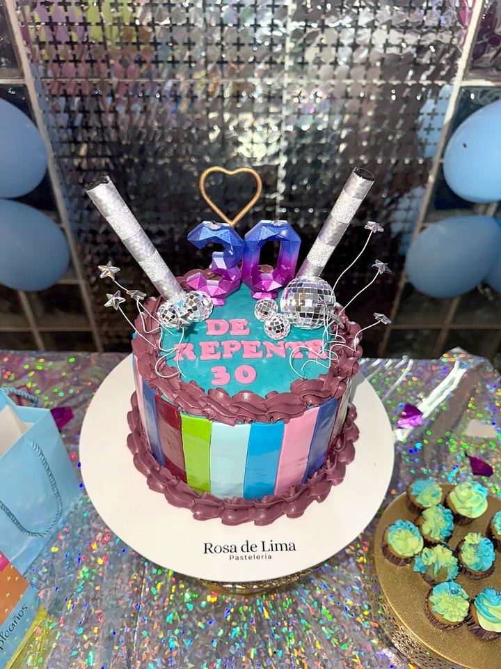 30th birthday cake with disco balls and colorful stripes in Playa del Carmen