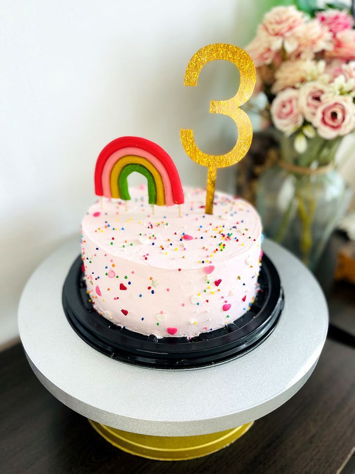 Rainbow confetti cake for a 3rd birthday in Playa del Carmen