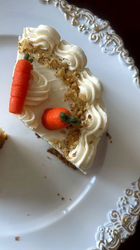 Slice of carrot cake with sugar carrots in Playa del Carmen
