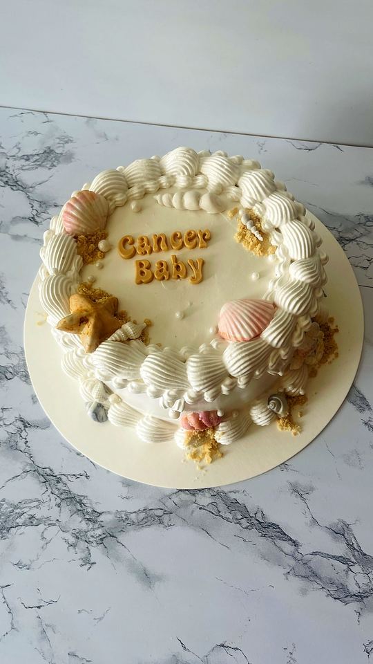 White cake with seashells in Playa del Carmen