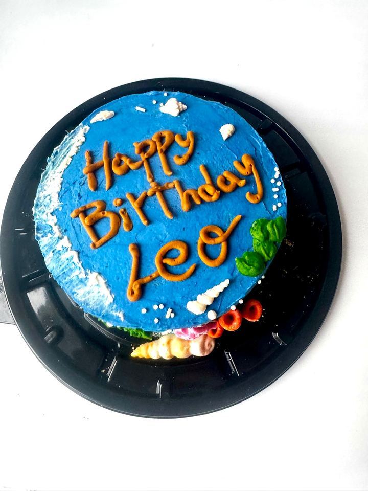 Blue cake with waves, shells and buttercream corals in Playa del Carmen