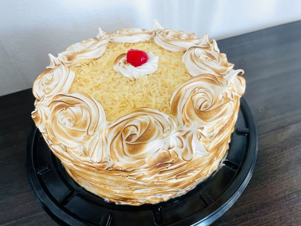 Tres leches cake with torched meringue in Playa del Carmen