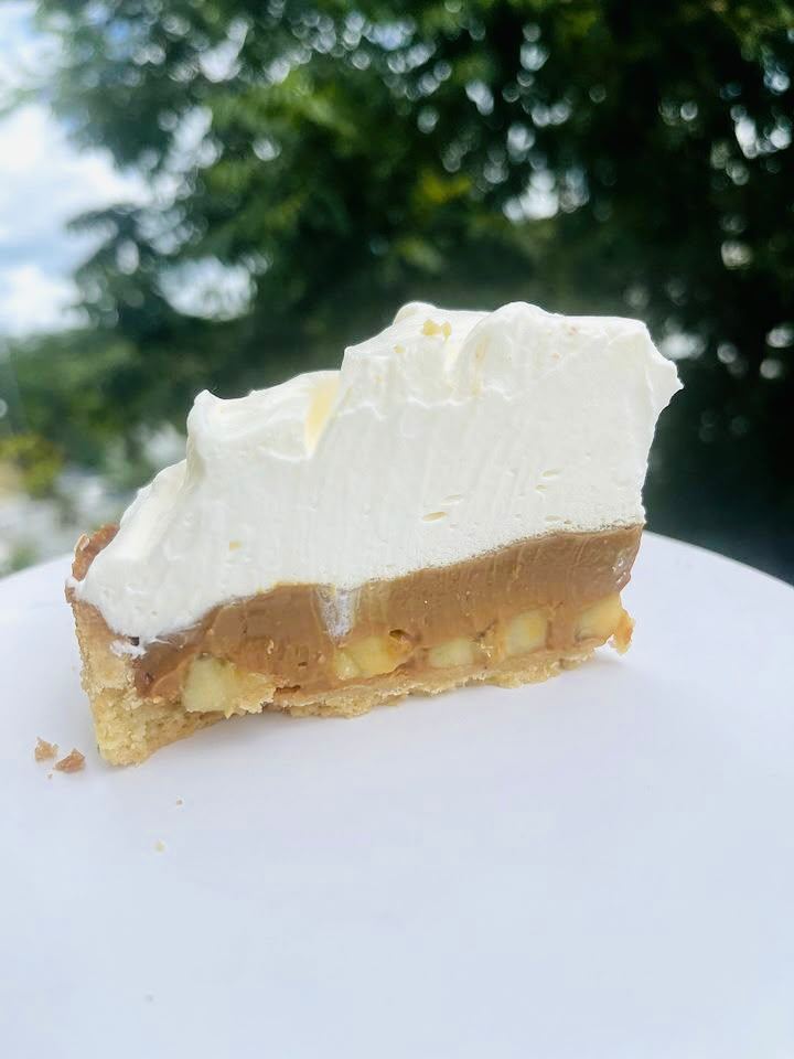 Slice of tart with dulce de leche and cream in Playa del Carmen
